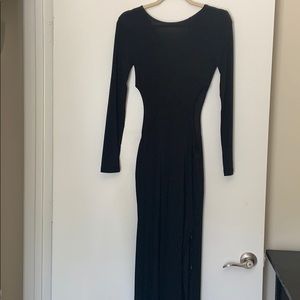 Black Maxi Dress with high slit and cutouts.